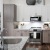 a kitchen with white cabinets