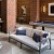 a living room with a couch and a pool table