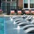 a pool with chairs around it