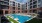 a pool in front of a building