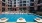 a pool in front of a building