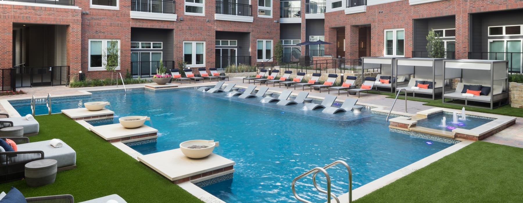 a pool with chairs around it